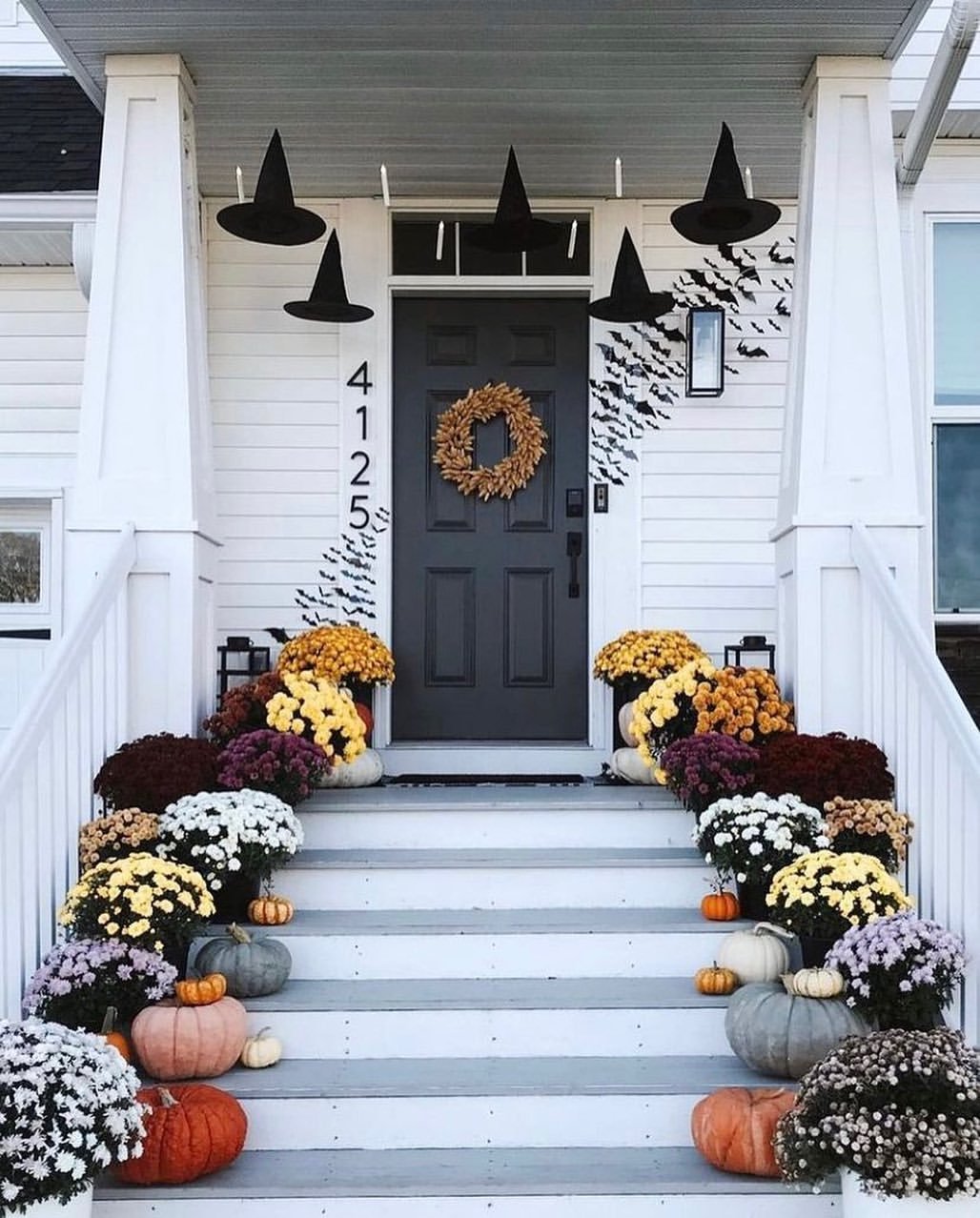 14 Halloween Porch Decor Ideas That Aren't Cheesy 1 Halloween porch idea The witch hats just do it for me How ‘bout youhalloweenporch hallowee