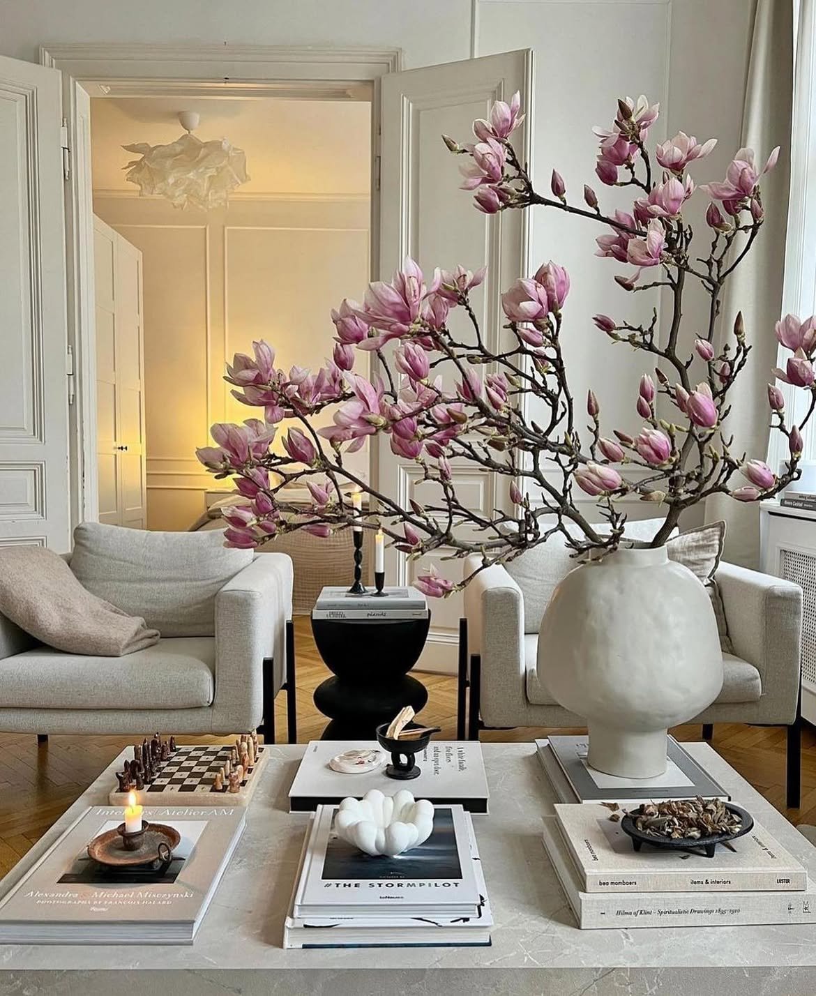 13 Stylish Coffee Table Decor Ideas for Any Aesthetic 1 I want a magnolia tree in my living room Beautiful coffee table decor set. Repost @interiorbyg